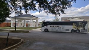 Atchison Transportation Services, Inc. in front of the  new fraternity and sorority houses at Wofford College